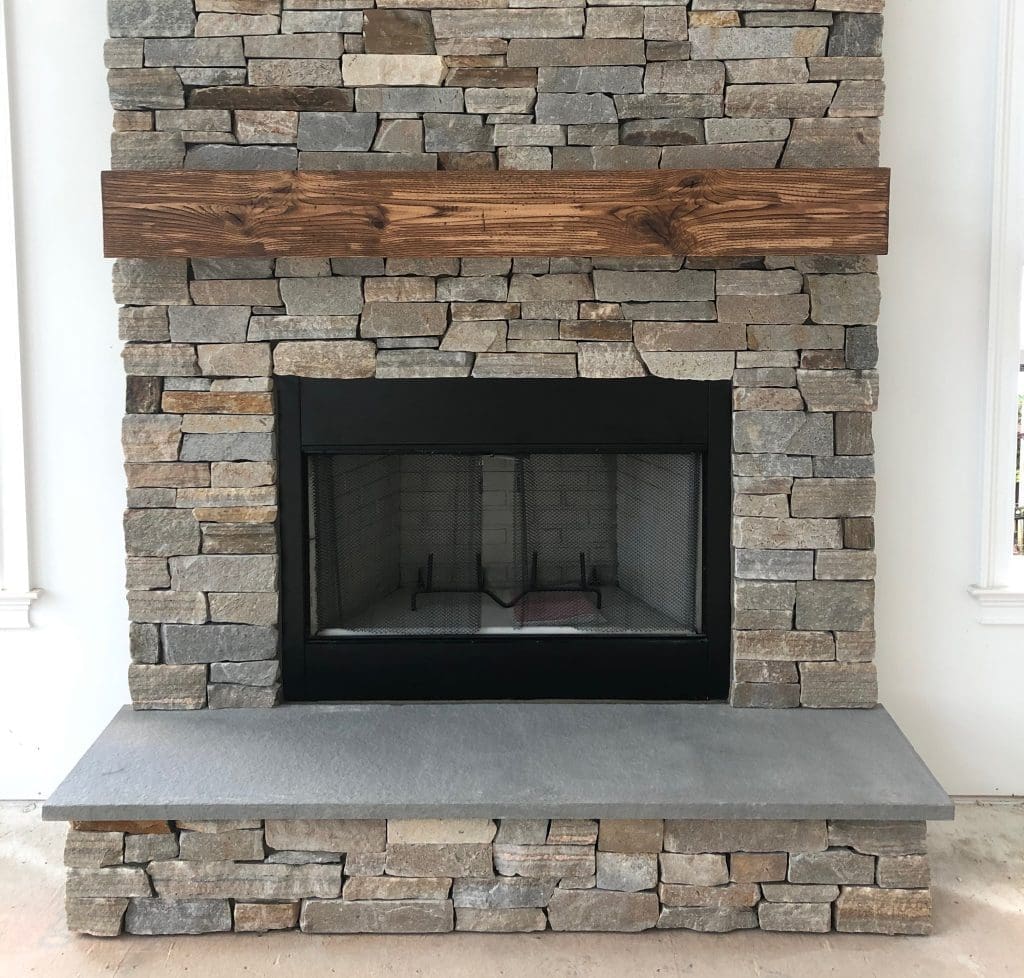 a ledge stone fireplace
