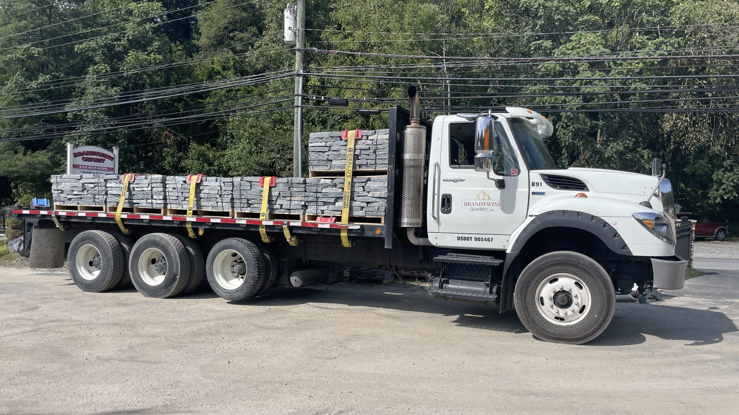 A delivery truck carrying stone stepping.