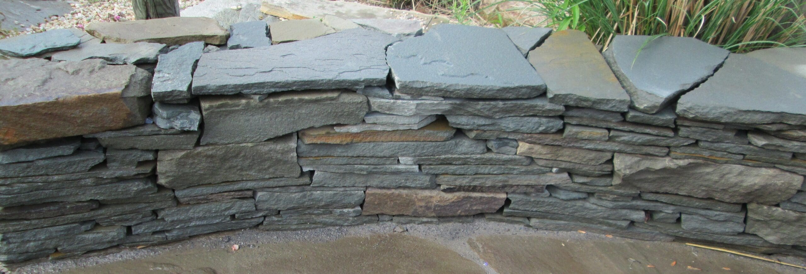 A retaining wall made from Bluestone.